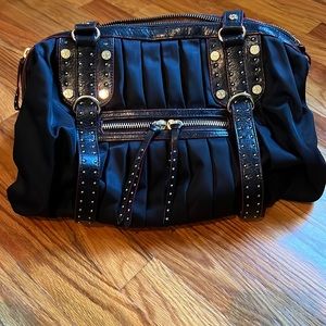 Black MZ Wallace shoulder bag with cross body strap and gold studded detail